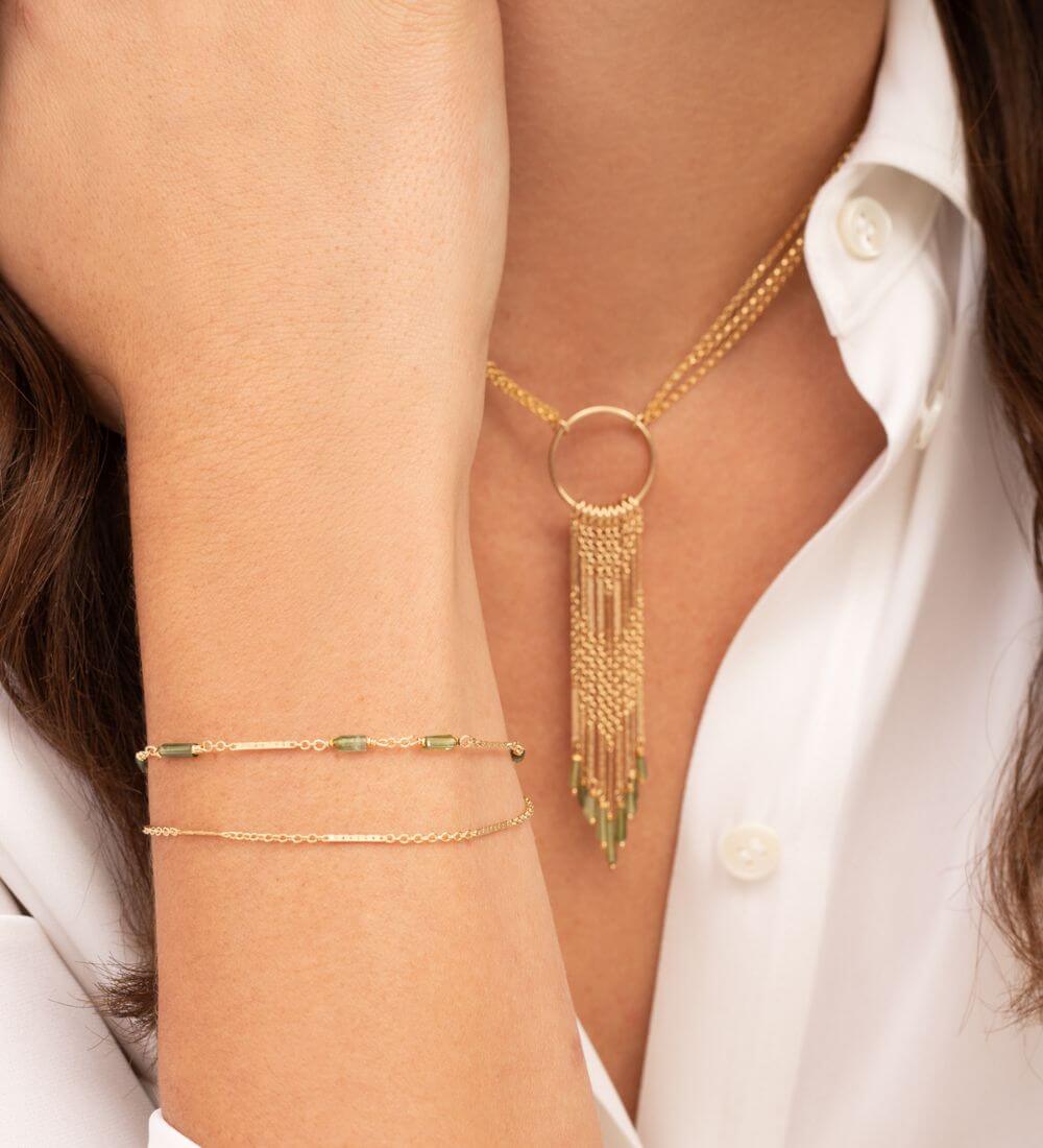 A modern working woman wearing contemporary silhouettes from Kate Winternitz