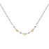 A delicate necklace featuring a fine silver chain with small gold and black beads, accented by three gold flower-shaped charms in the center, displayed on a clean white background.