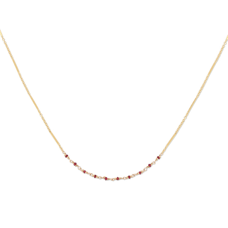 Gold chain necklace with ten ruby beads 