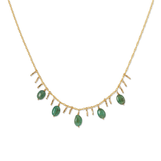 A gold-colored emerald necklace with multiple emerald pendants and gold accents.