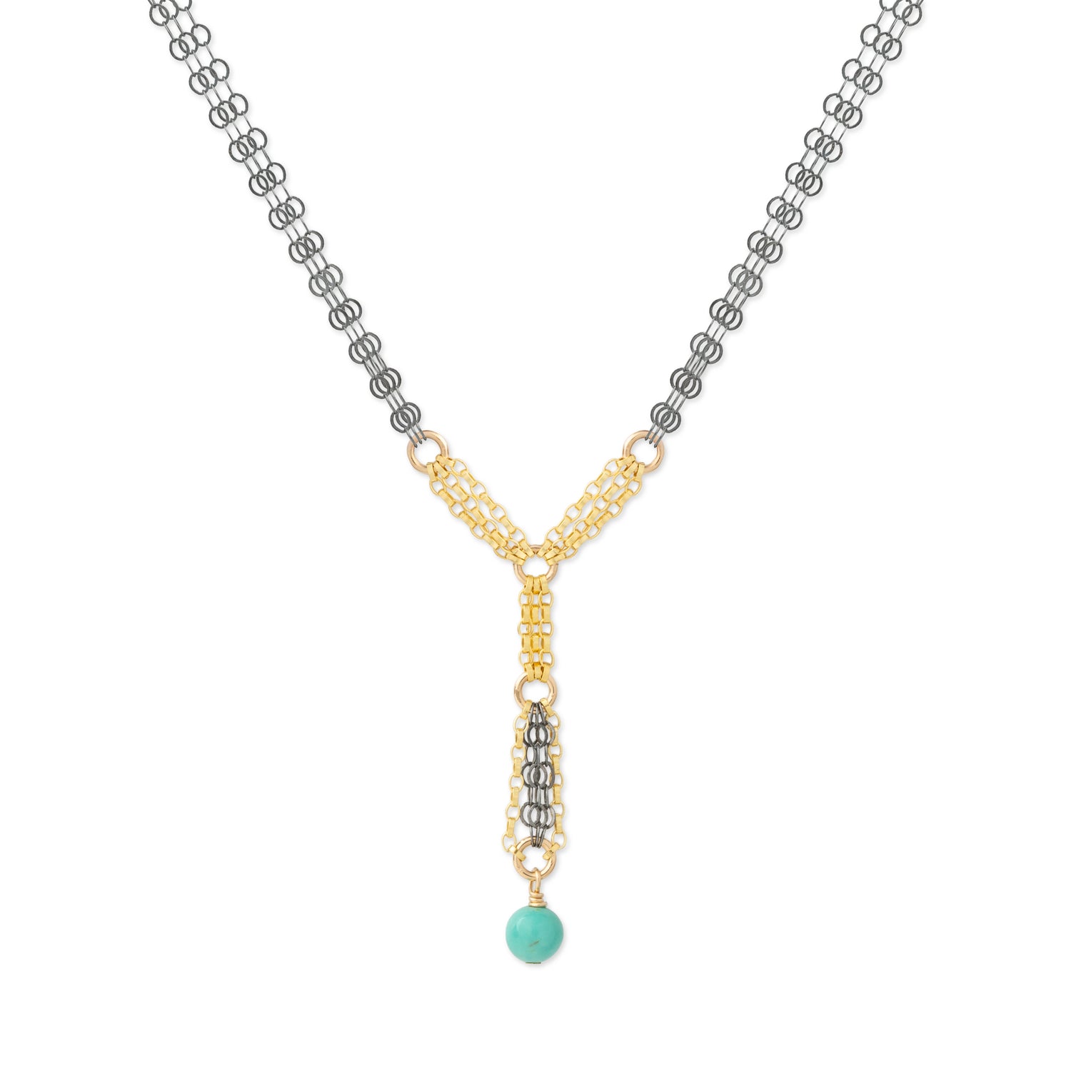 A Y-shaped necklace featuring a gold and silver chain design with a turquoise bead pendant, shown on a plain white background.