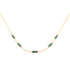 Necklace with teal tourmaline beads on a gold chain against a white background