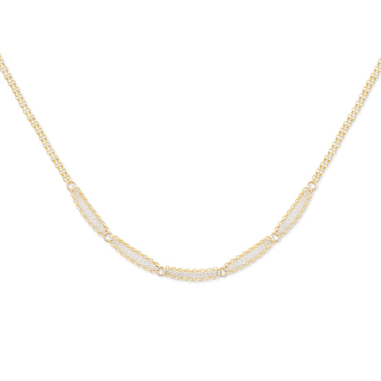 A double-stranded mixed metal necklace with gold-fill and sterling silver chains, displayed on a plain background.