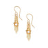 Gold earrings with pearl accents on a white background