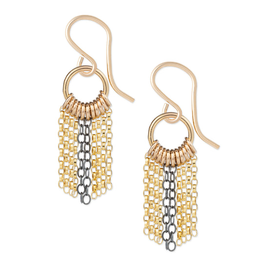 Gold and silver chain earrings on a white background