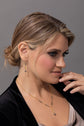 Model is in profile wearing the Miku necklace and Misaki earrings 