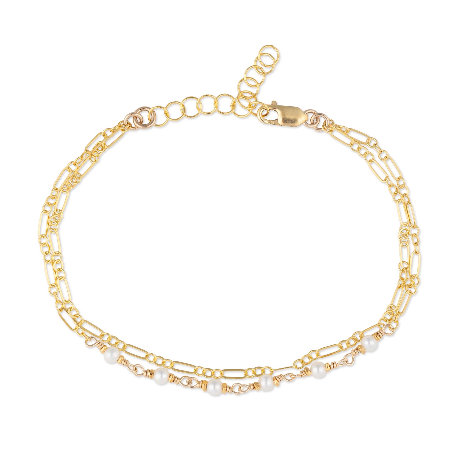 Gold chain bracelet with pearl accents on a white background