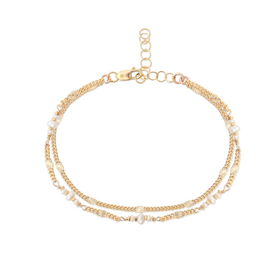 A double-stranded bracelet with a 14K gold-fill textured chain and organic keshi pearls.