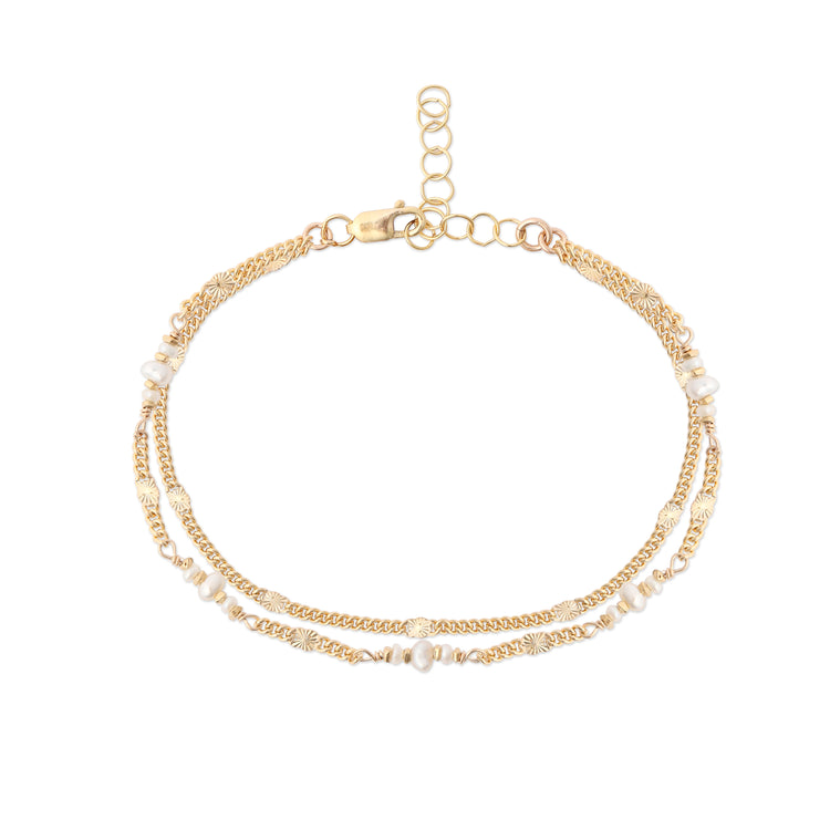 A double-stranded bracelet with a 14K gold-fill textured chain and organic keshi pearls.
