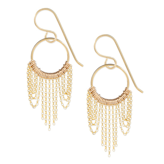 Gold hoop earrings with chain fringe on a white background