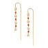 A pair of gold-colored threader earrings featuring red coral beads and gold accents, displayed against a white background.