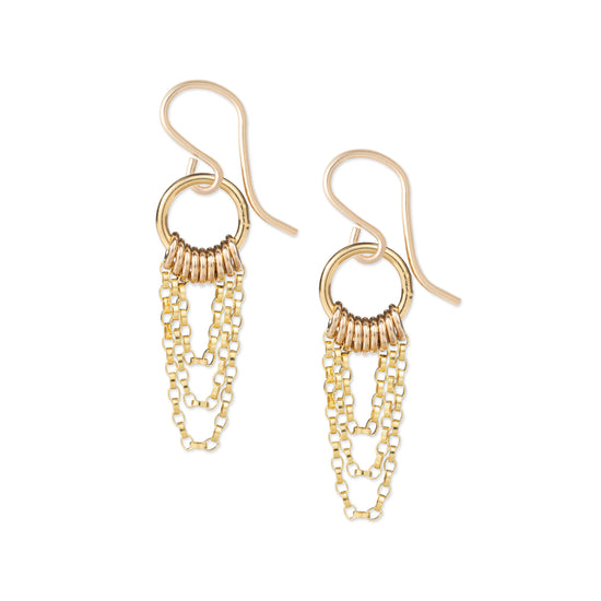 Gold chain earrings on a white background