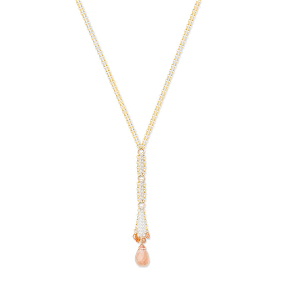 A gold-filled necklace with a sterling silver chain and a sunstone drop accented with smaller sunstone gemstones.