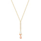 A gold-filled necklace with a sterling silver chain and a sunstone drop accented with smaller sunstone gemstones.