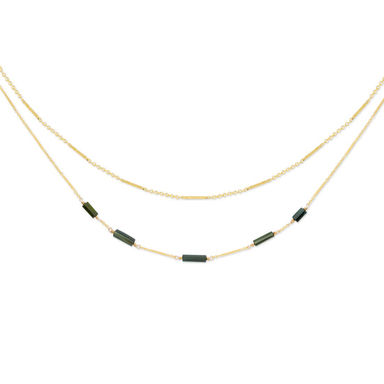 Linda double-stranded gold necklace with a bar and link chain, accented with green tourmaline stones, shown on a white background.